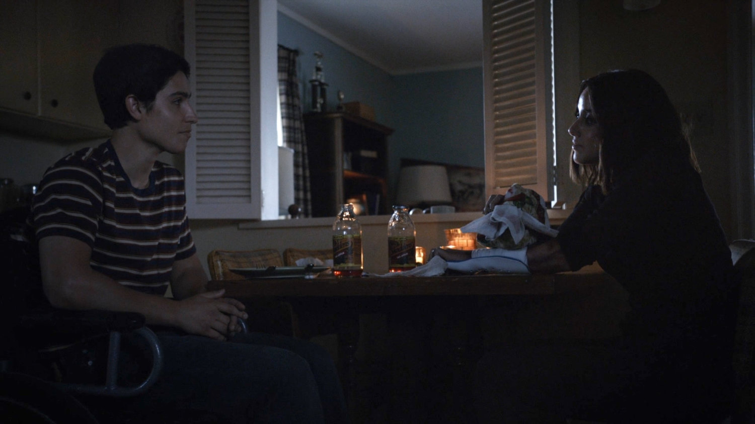 Gabe and Daisy in his house.