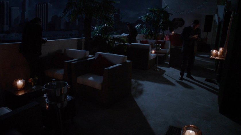 Fitz on blacked out Miami hotel roof deck.