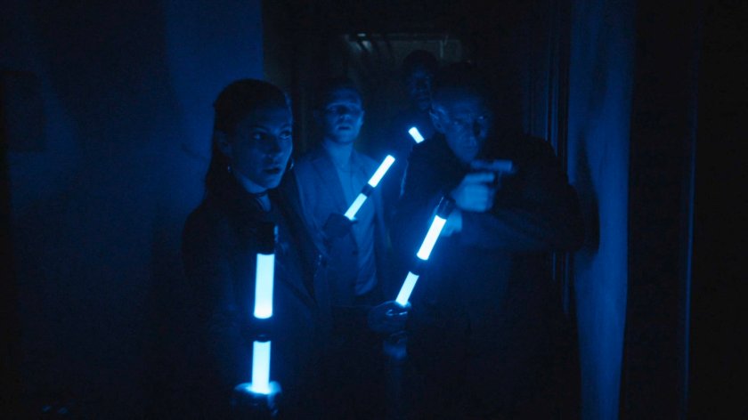 SHIELD Agents in blacked out hallway.