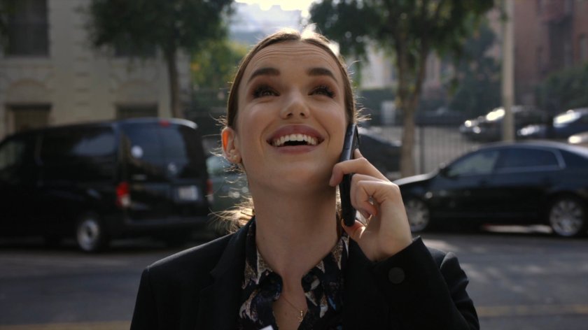 Simmons on sidewalk outside The Langham apartments.