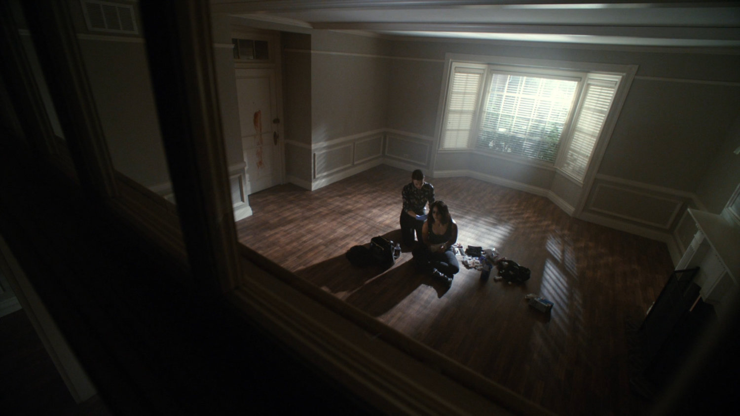Simmons and Daisy in an empty apartment of The Langham.