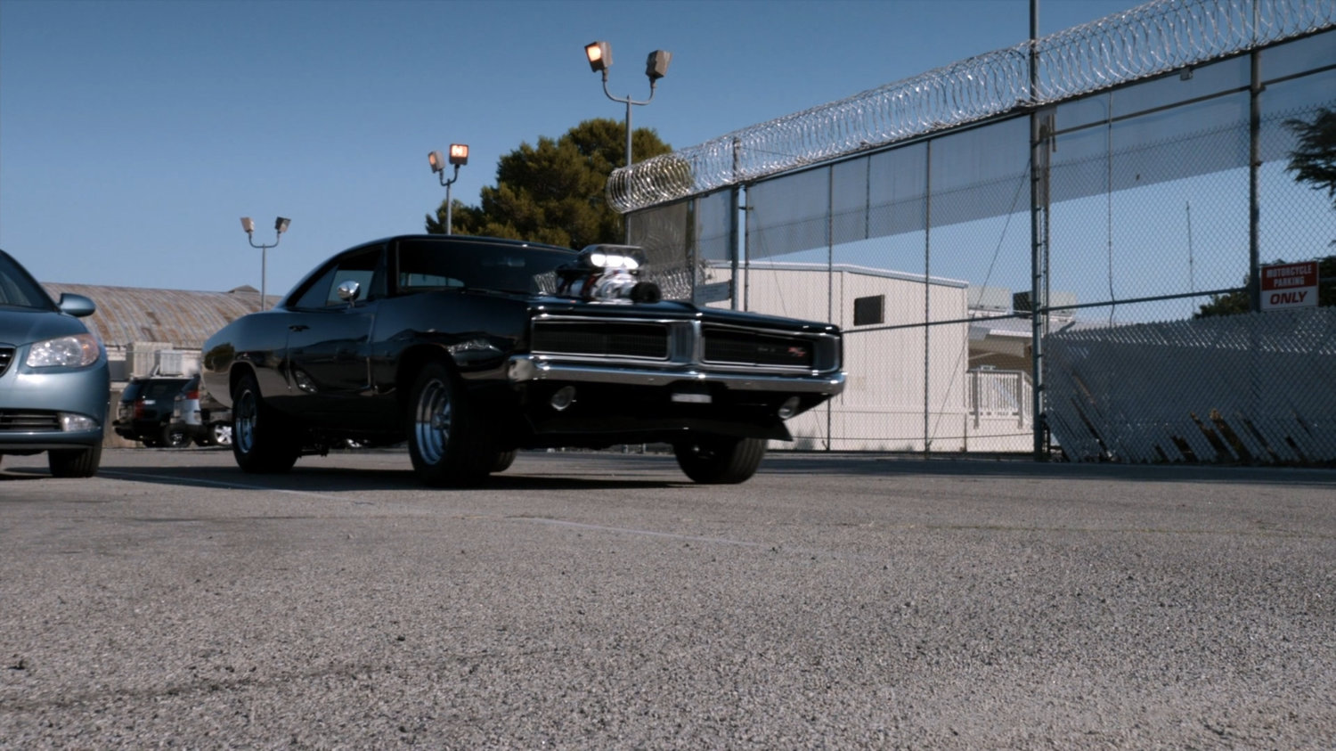 Black Charger outside South Ridge Penitentiary.