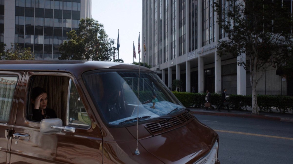 Daisy and Simmons in van outside Los Angeles SHIELD office building.