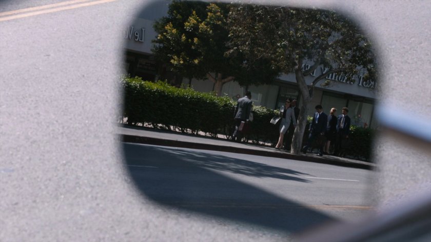 Exterior of Los Angeles SHIELD office building reflected in van mirror.