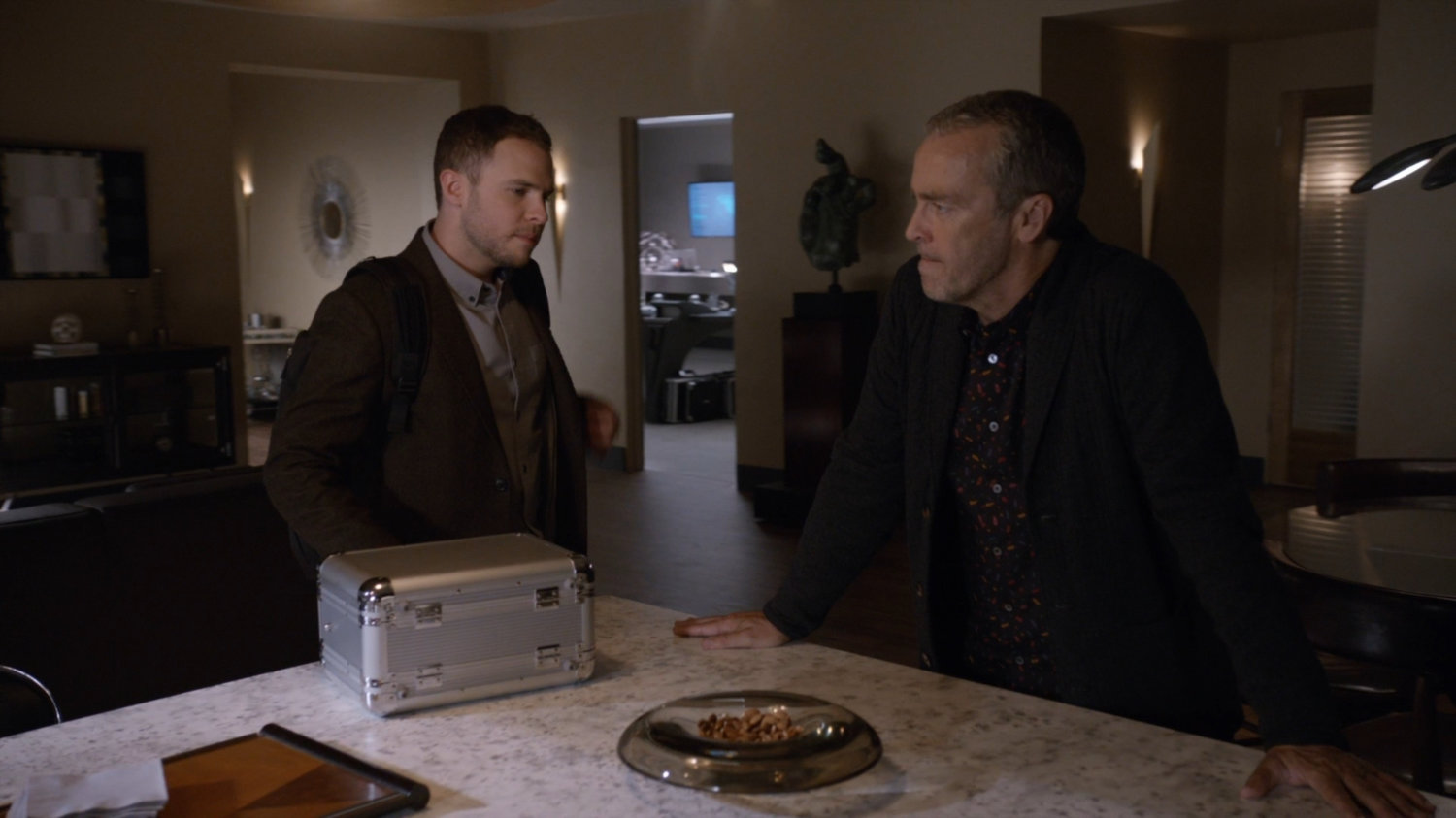 Fitz and Radcliffe in his house.