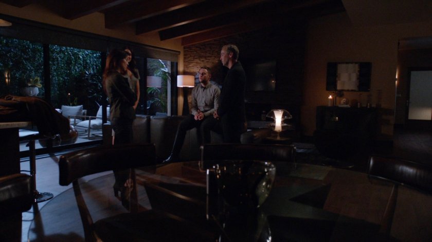 May, Aida, Fitz, and Radcliffe in his living room.