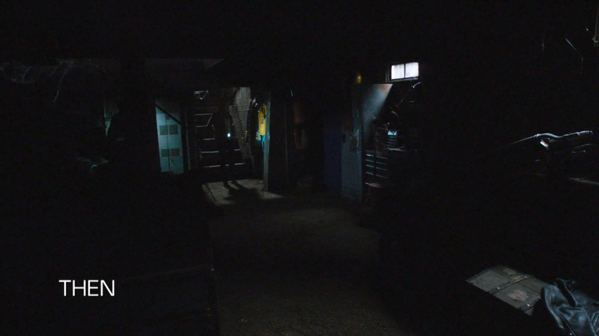 Joseph and Lucy Bauer enter a dark basement.