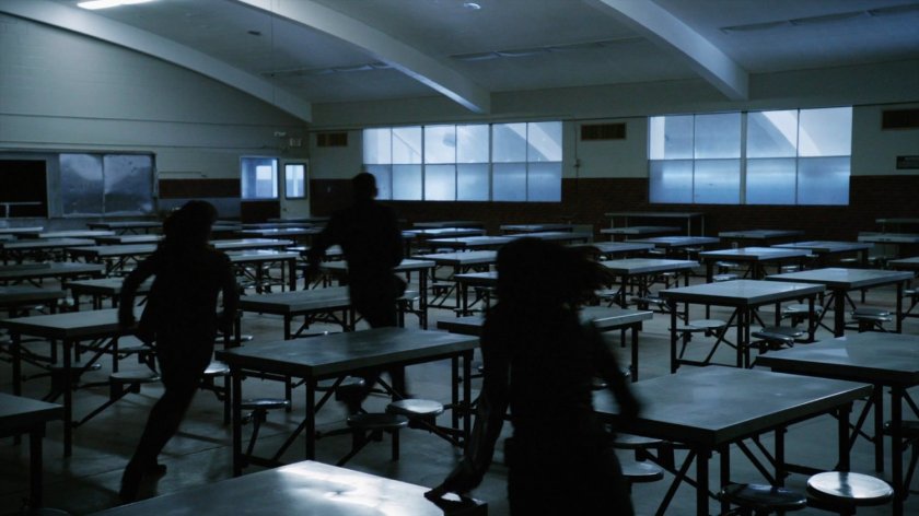 Daisy, May, and Coulson running through the cafeteria at South Ridge Penitentiary.