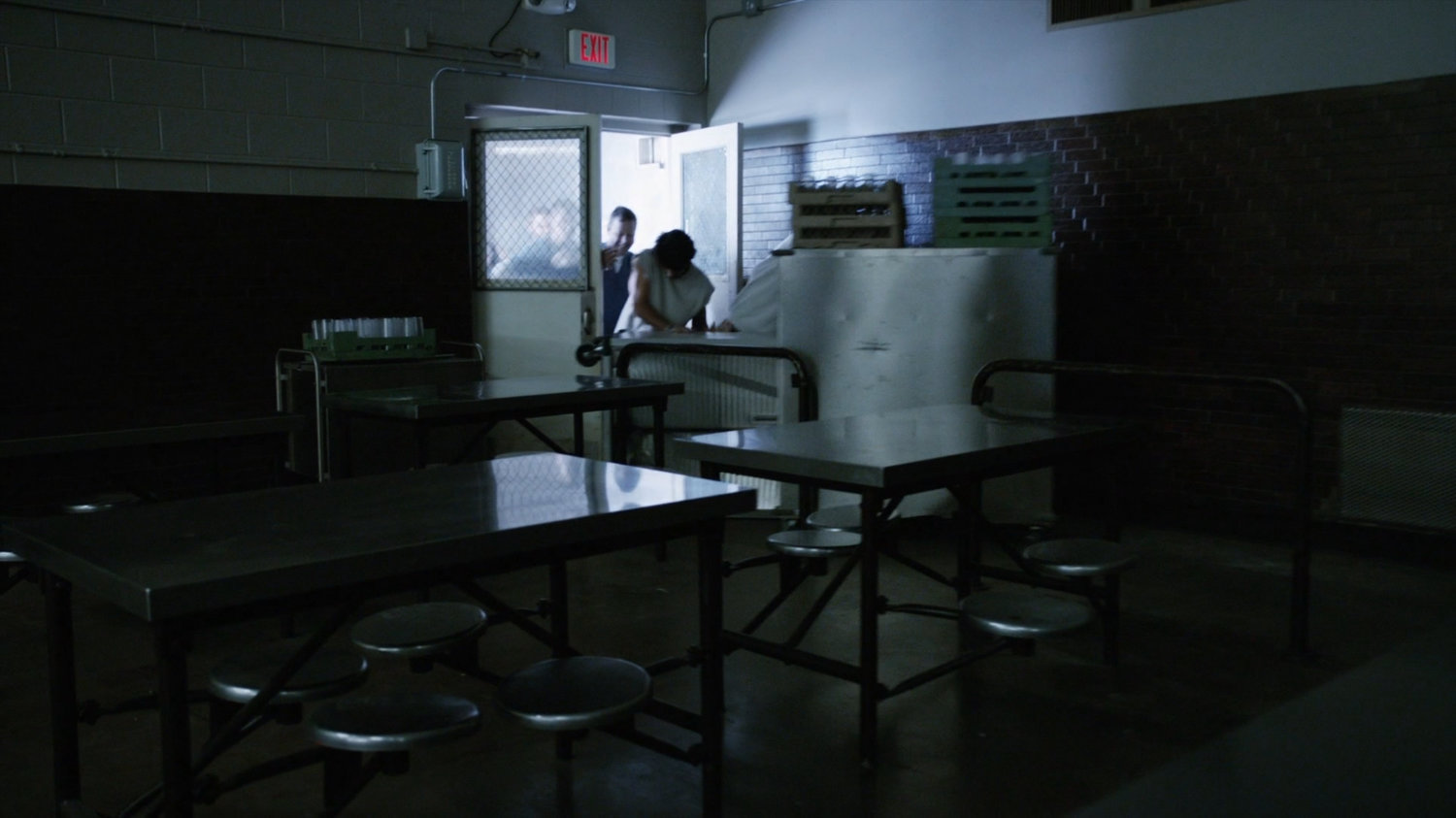 Prisoners fight their way into the cafeteria at South Ridge Penitentiary.