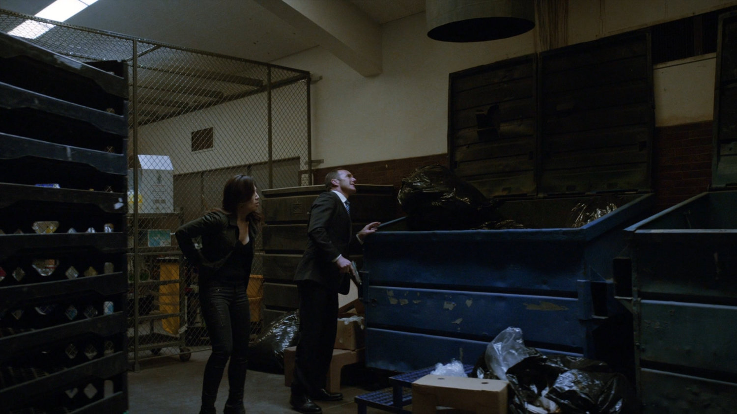 Coulson and May in the garbage room at South Ridge Penitentiary.