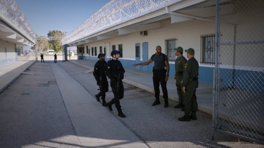 Mack, SHIELD agents, and guards outside South Ridge Penitentiary.