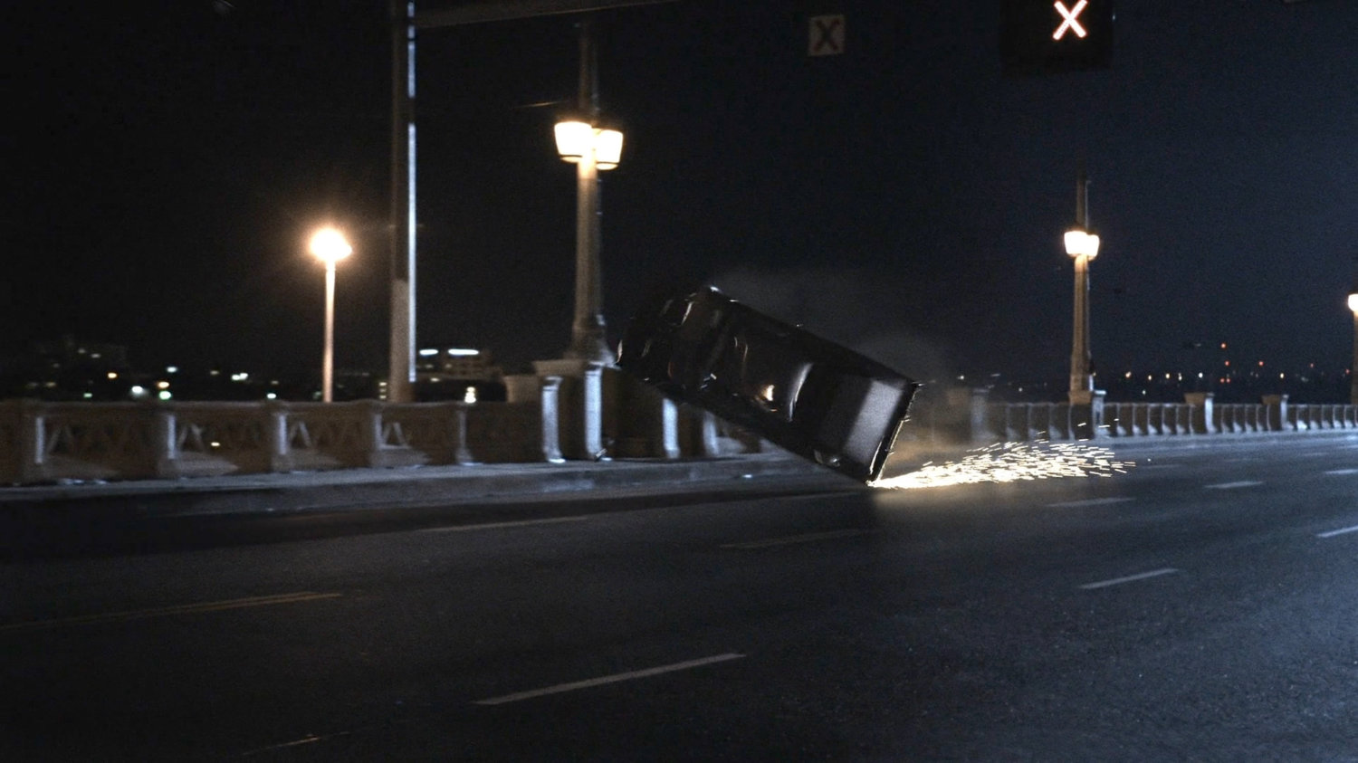 Black Charger flipping on Los Angeles bridge.