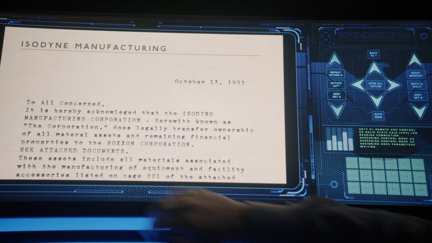 Computer screens of paperwork transferring Isodyne assets to Roxxon.