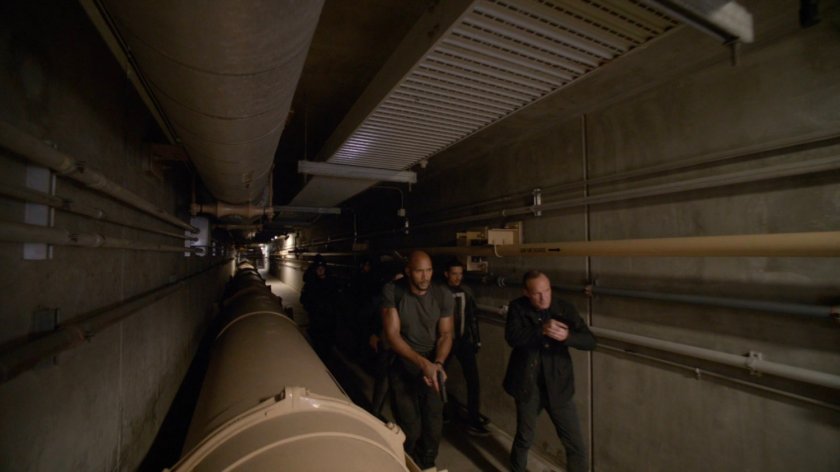 Mack, Robbie and Coulson in Roxxon Power Station corridor.
