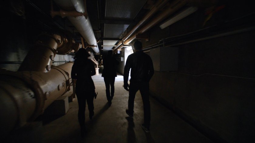 SHIELD agents in Roxxon Power Station corridor.