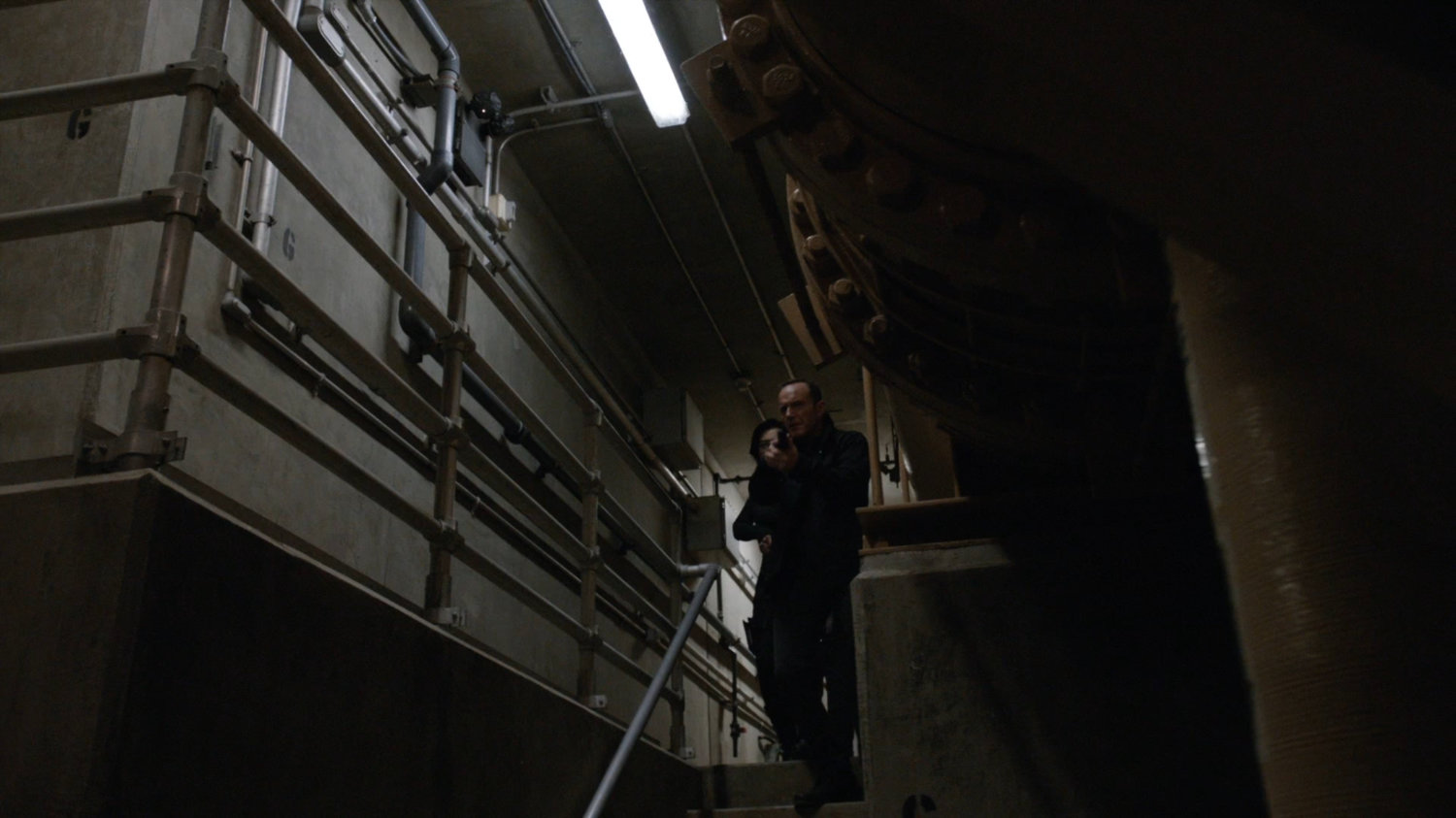 Coulson and May in Roxxon Power Station corridor stairway.