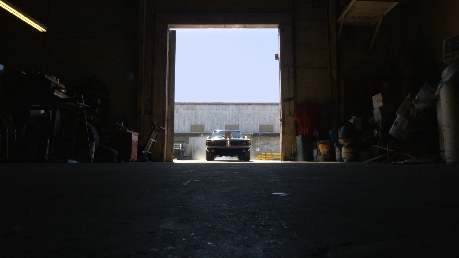 Black Charger entering the Chinatown Crew Warehouse.