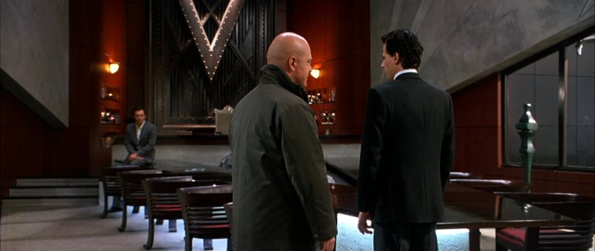 Reed and Ben with Victor in the boardroom of Von Doom Industries.