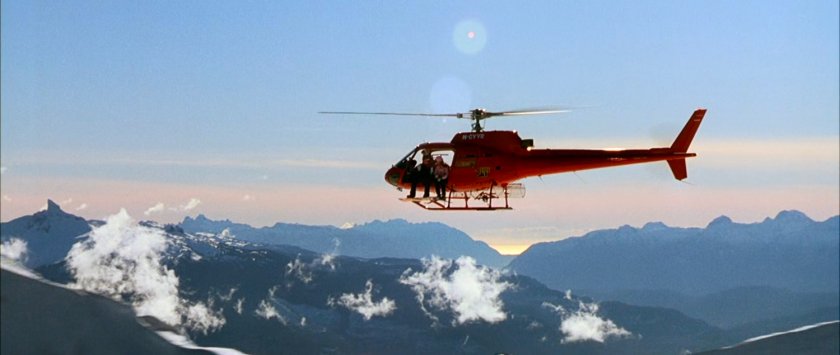A helicopter over the snowy mountains near the Von Doom compound.