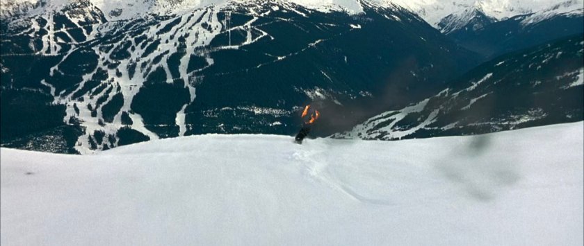 Johnny skiing down snowy mountains near the Von Doom compound.