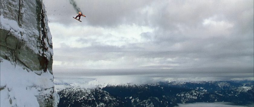 Johnny skiing off a snowy mountains near the Von Doom compound.