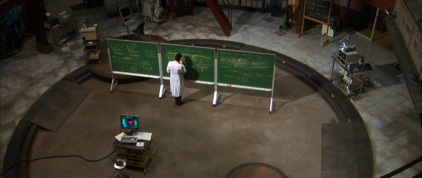 Reed working on his blackboard in the Baxter Building laboratory.