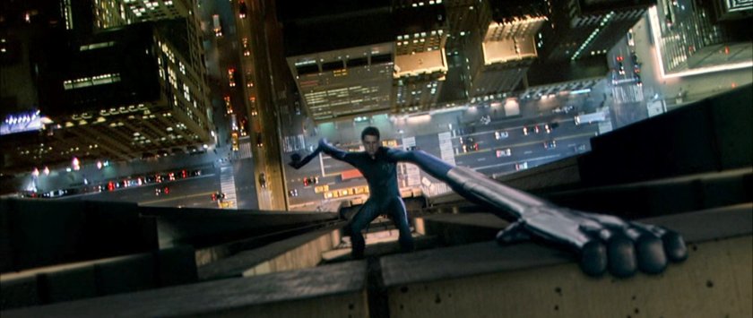 Reed hanging on to the side of the Baxter Building.