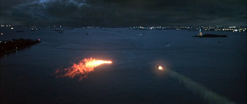 The Human Torch pursued by a heat seeking missile toward the Statue of Liberty.