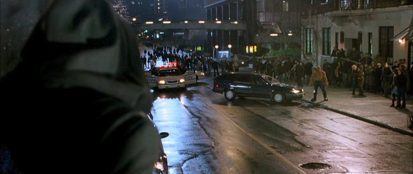 The Thing on a New York sidewalk facing Doctor Doom.