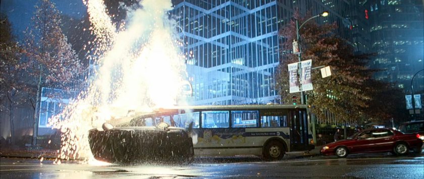 A bus explodes in a shower of sparks.