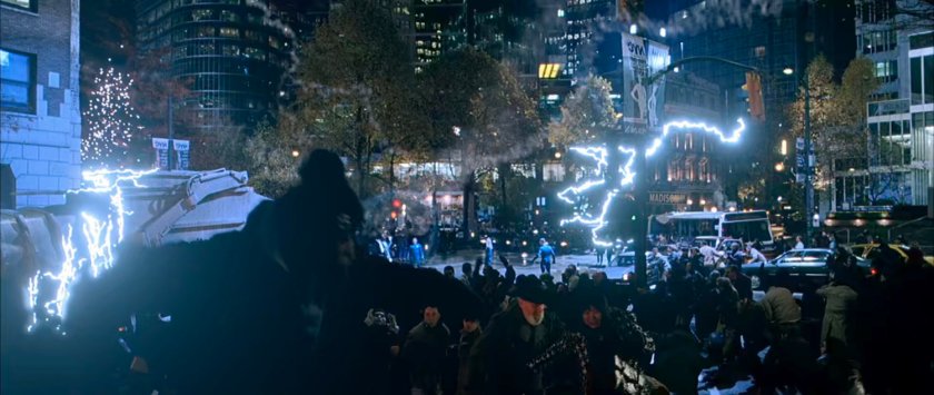 The Fantastic Four fighting Doctor Doom in a New York intersection.