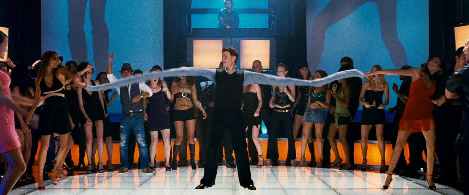 Reed dancing at a bachelor club party at a club.