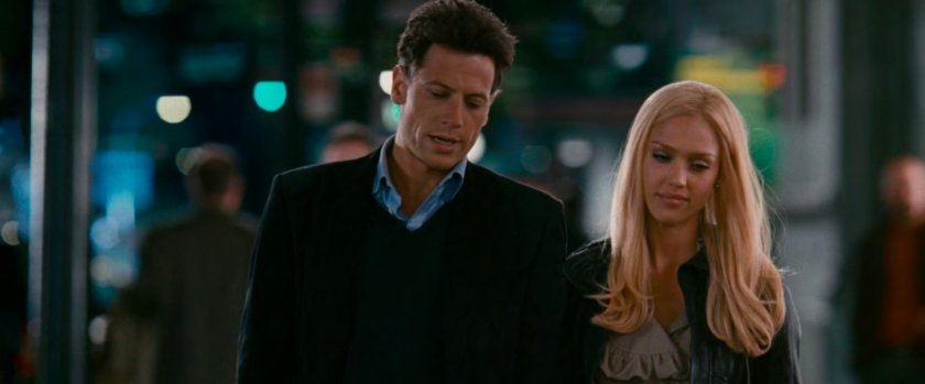 Reed and Sue on the sidewalk at night.