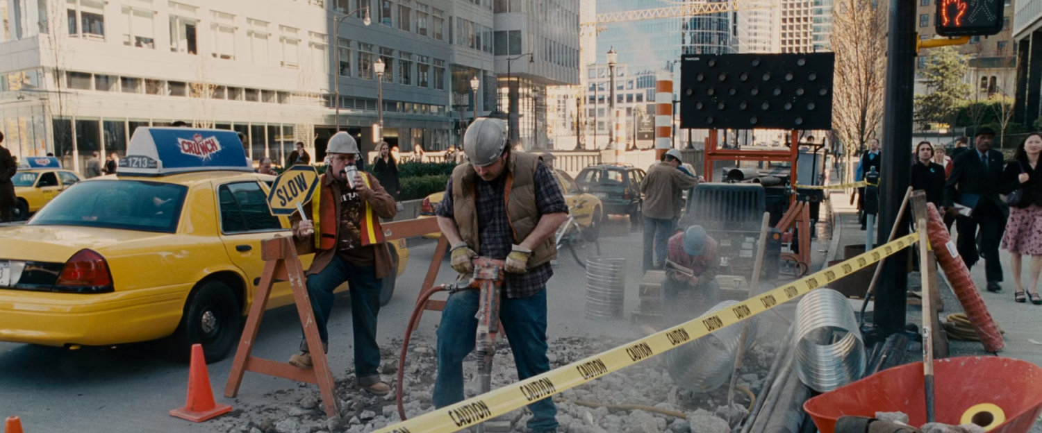Construction workers working on the street.