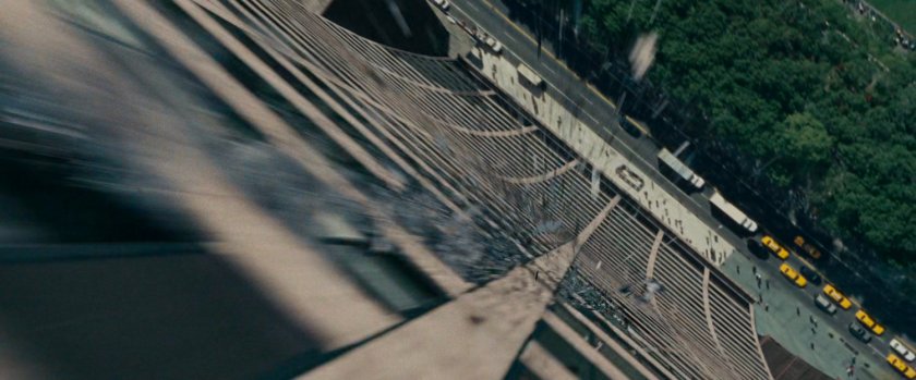 The Silver Surfer flying down the Grace Building.