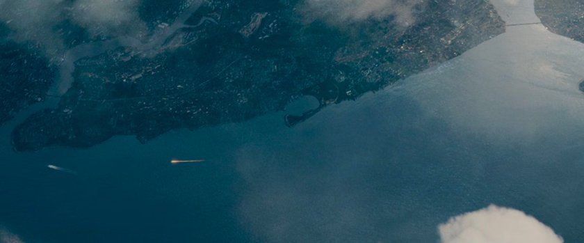 The Human Torch chasing Silver Surfer in the sky above Staten Island.