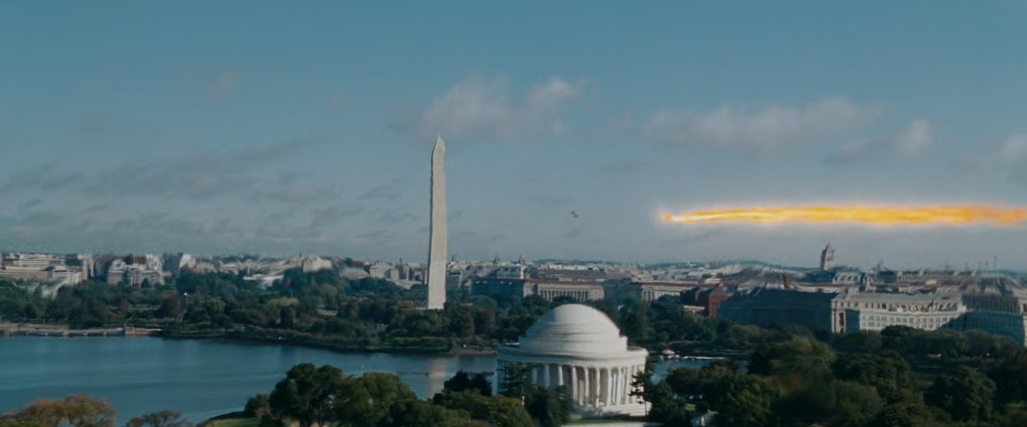 The Human Torch chasing Silver Surfer in the sky above Washington, DC.