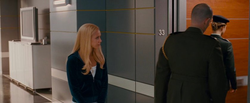 Sue escorting the military into the Baxter Building elevator on floor 33.