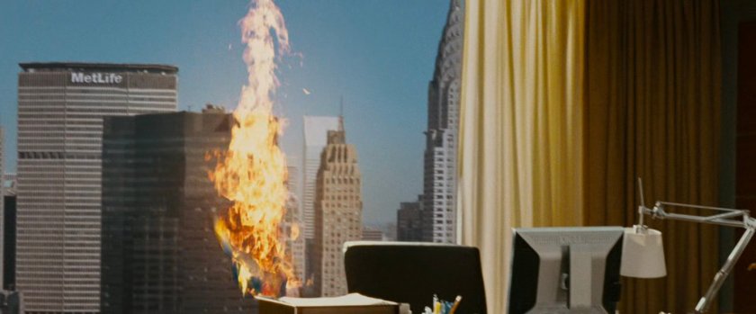 Sue, with Johnny's flame powers, outside a window of the Baxter Building.