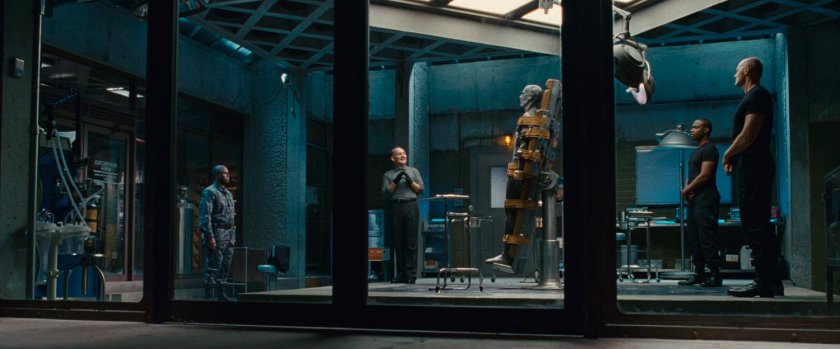 General Hager in an operating room at Inyeptuk Station with other men and the unconscious Silver Surfer..