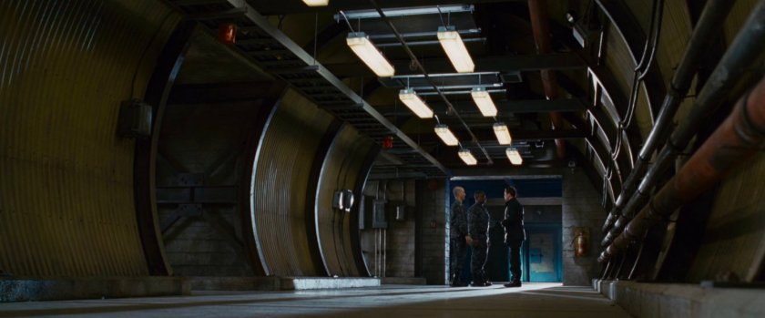 Army men in a hallway at Inyeptuk Station.