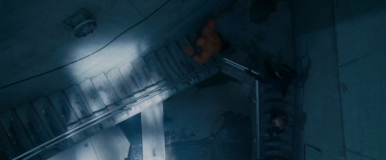 The Fantastic Four running up stairs at Inyeptuk Station.