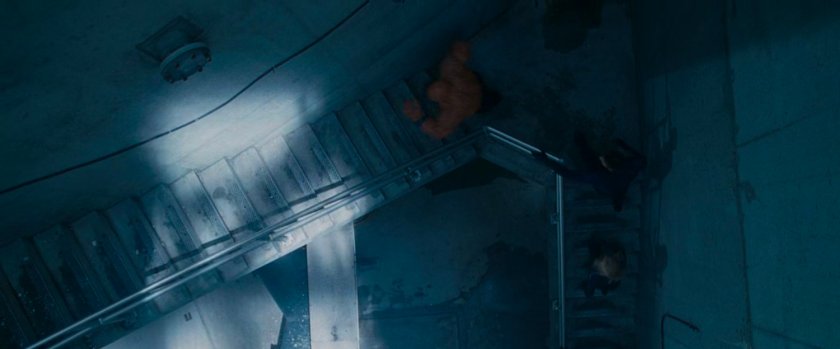 The Fantastic Four running up stairs at Inyeptuk Station.