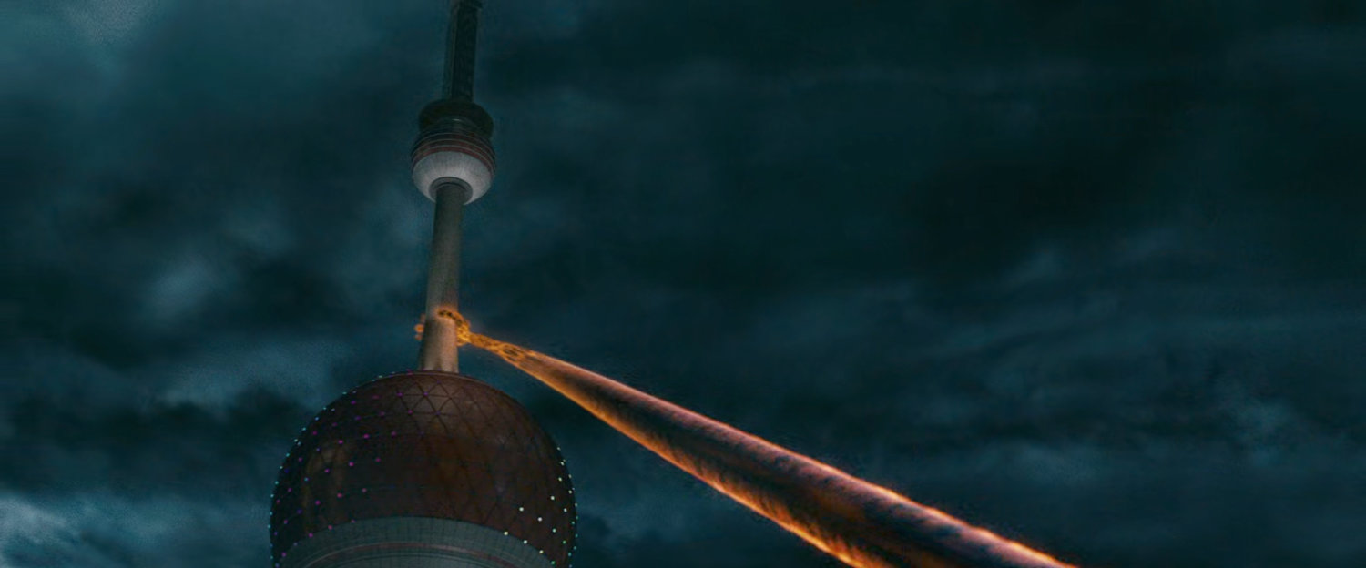 Johnny's arm grabs a Shanghai radio tower.