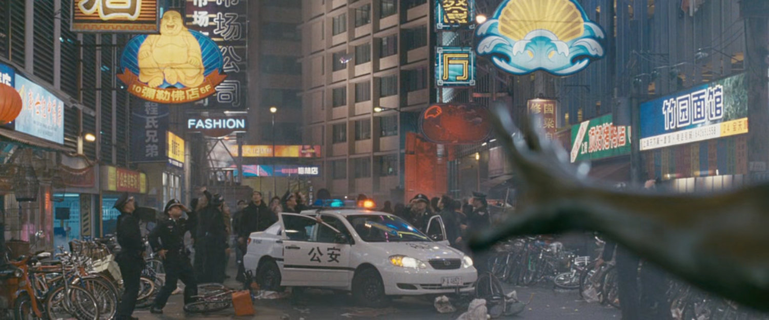 The Silver Surfer calls his board towards him on a Shanghai street.
