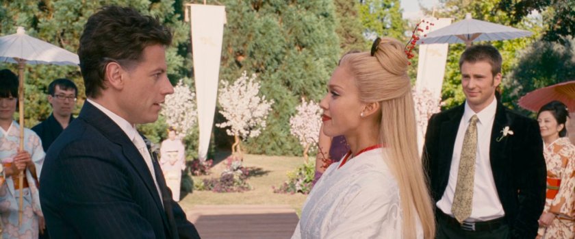 Reed, Sue, and Johnny at a Japanese temple by a lake.