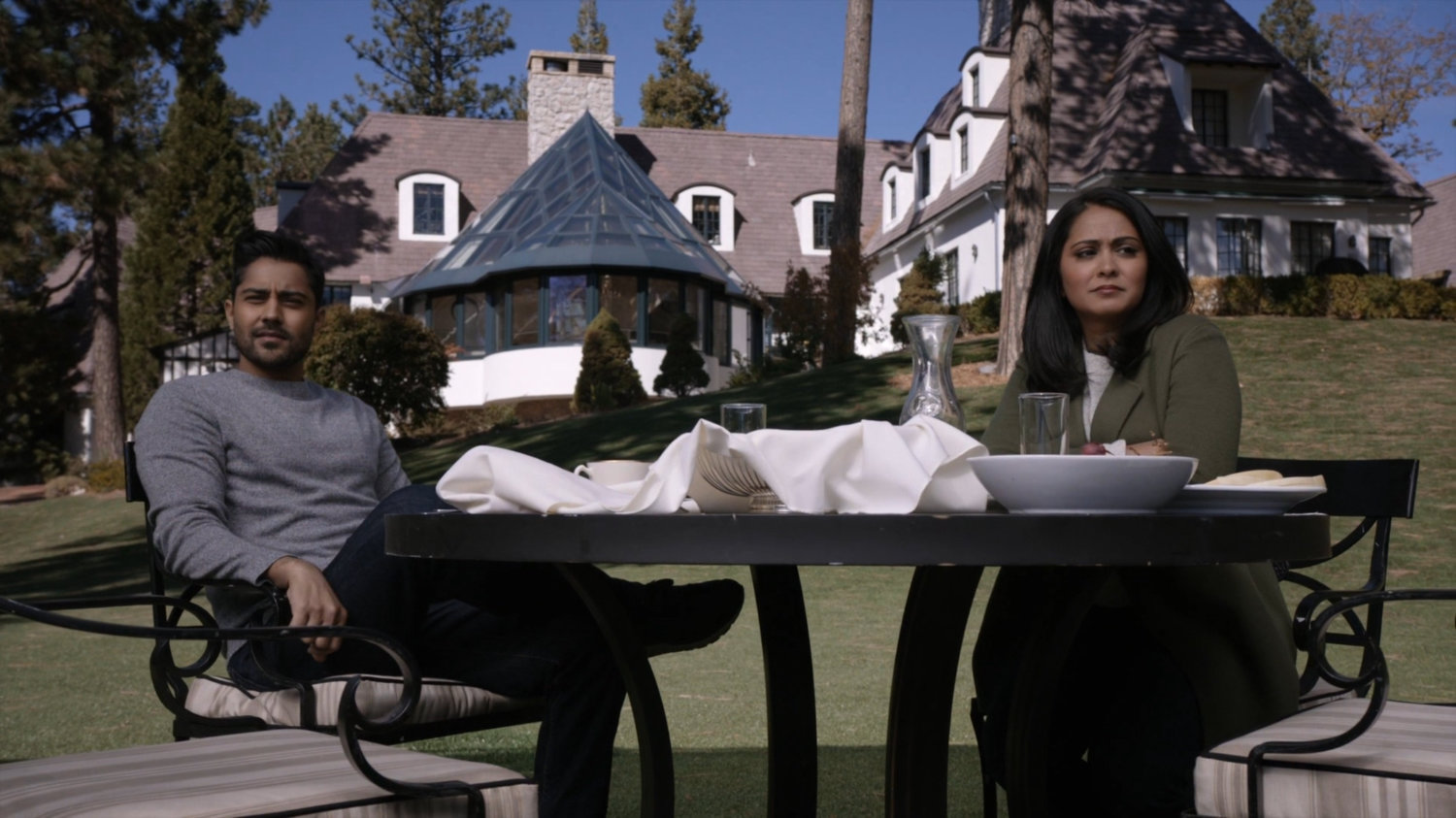 Vijay and Ellen outside her lake house.