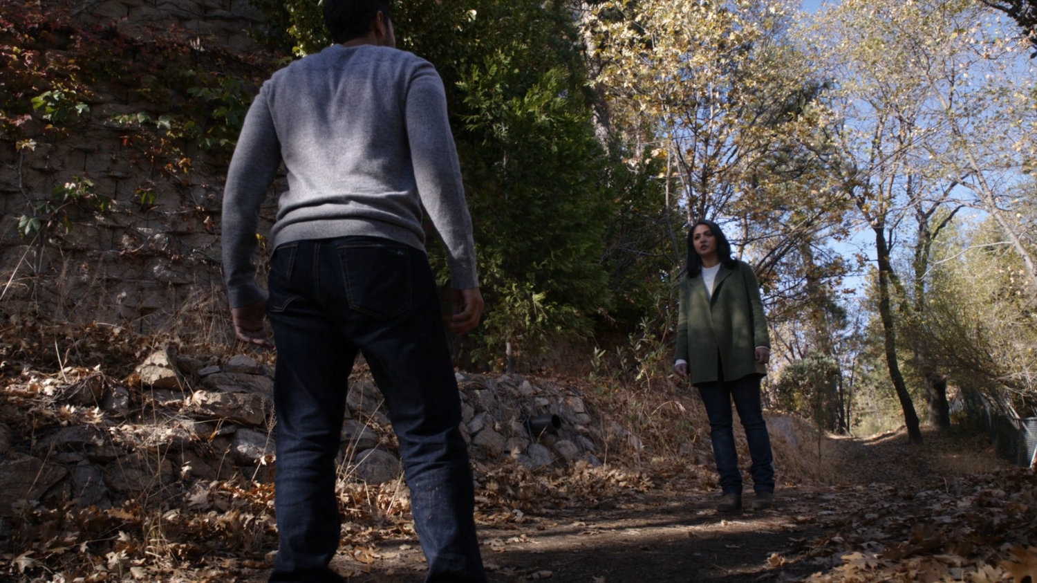 Vijay and Ellen along trail near her lake house.