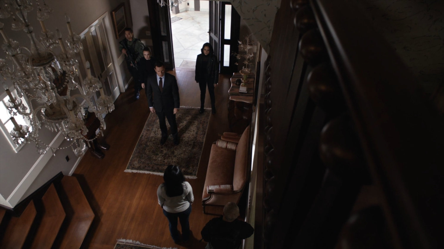 Director Mace, Simmons, and Daisy enter Ellen Nadeer's lake house.