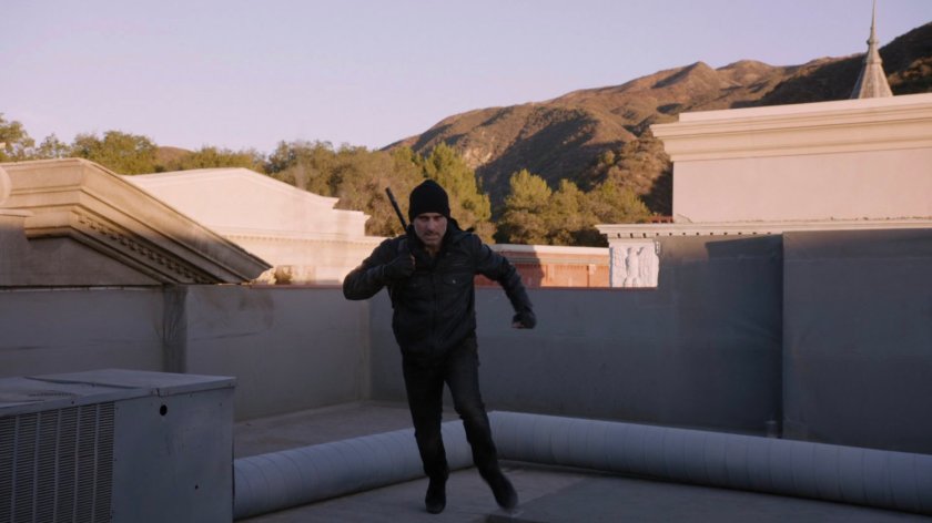 A sniper on a rooftop in Sunbury, Pennsylvania.